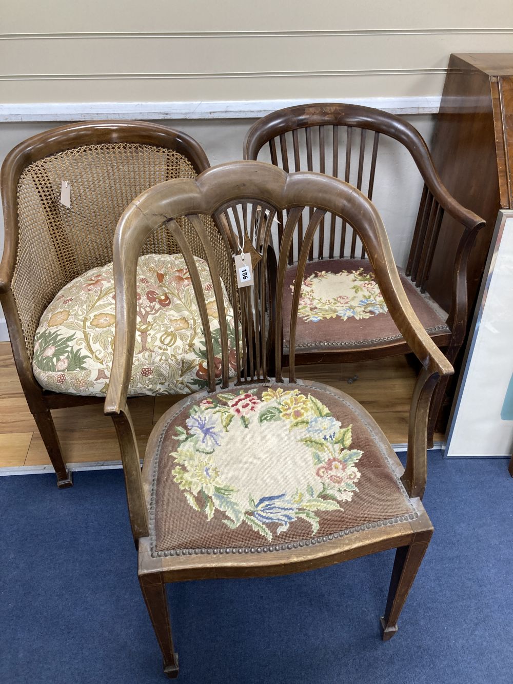 Three Edwardian mahogany armchairs